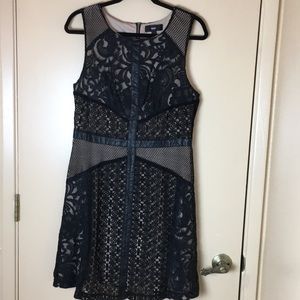 Super cute black lace dress over nude lining